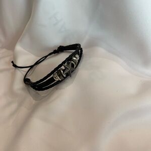 Black Leather Bracelet with Silver Star and Accents 8-9 in diameter. (1-111)